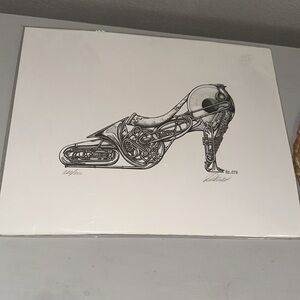 Shoehorns" by Don Stewart brass instruments shaped into a high-heeled